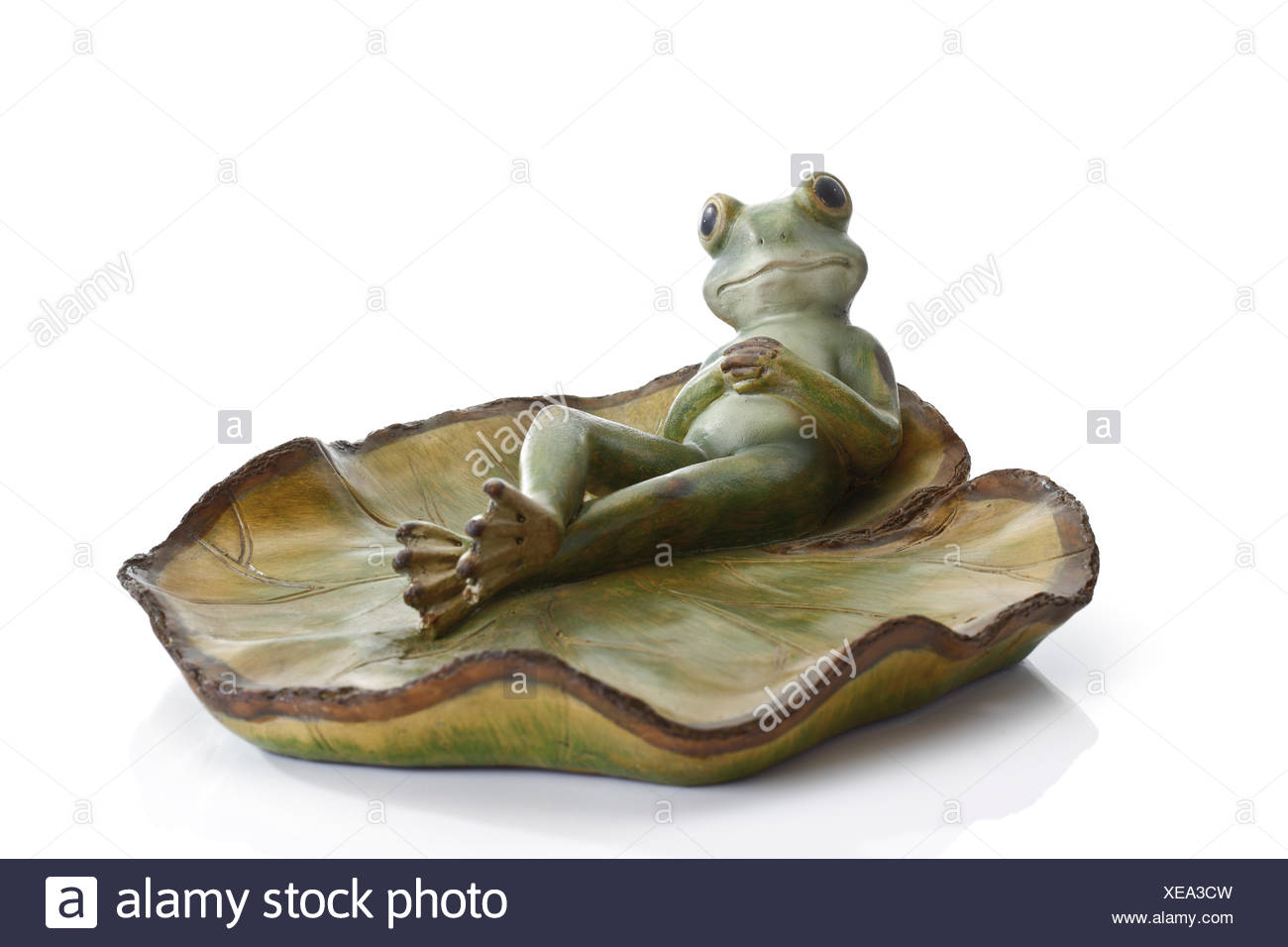Decor, frog laying back on lotus leaf Stock Photo: 284193305 - Alamy