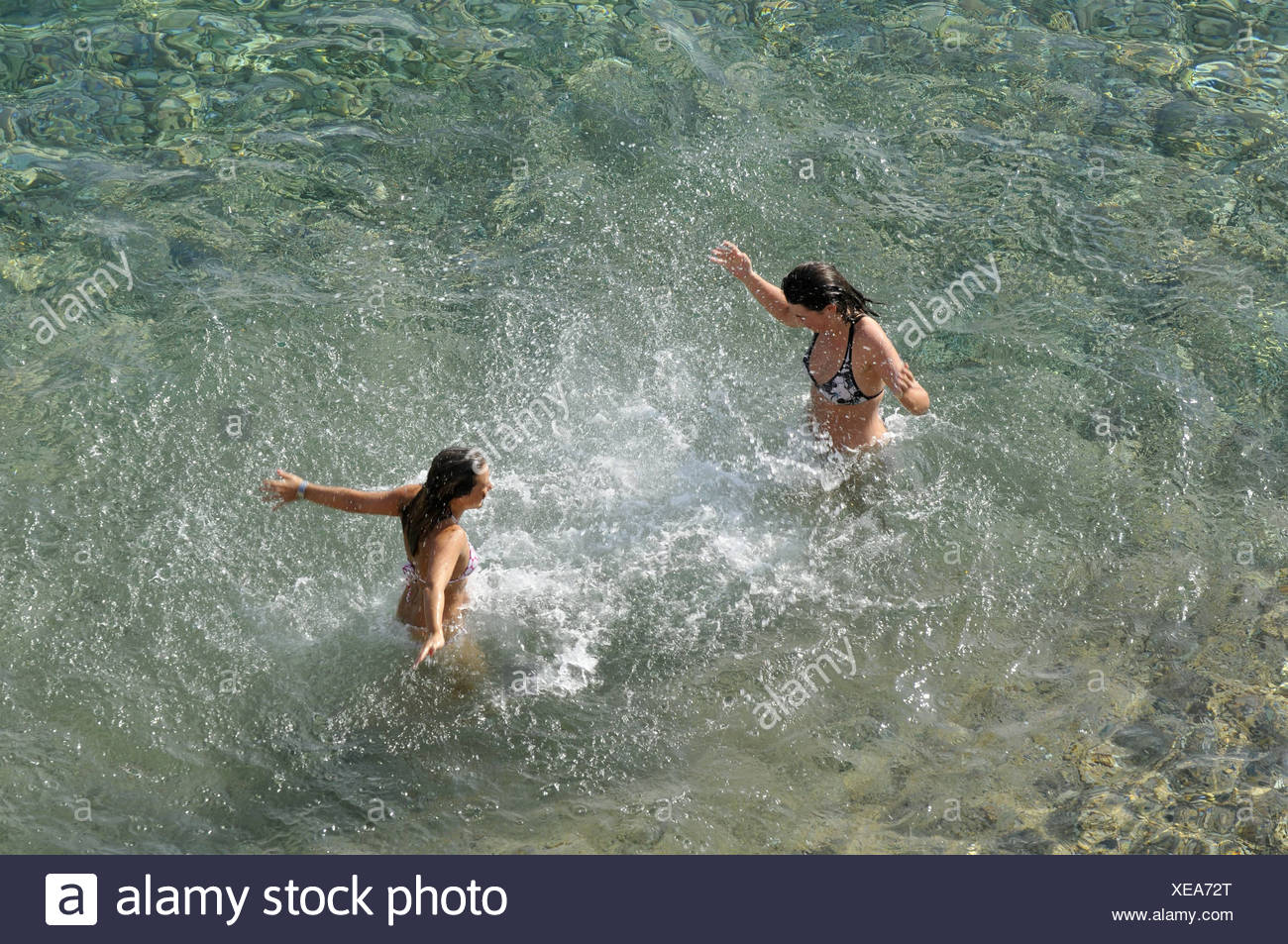 two girls bathing