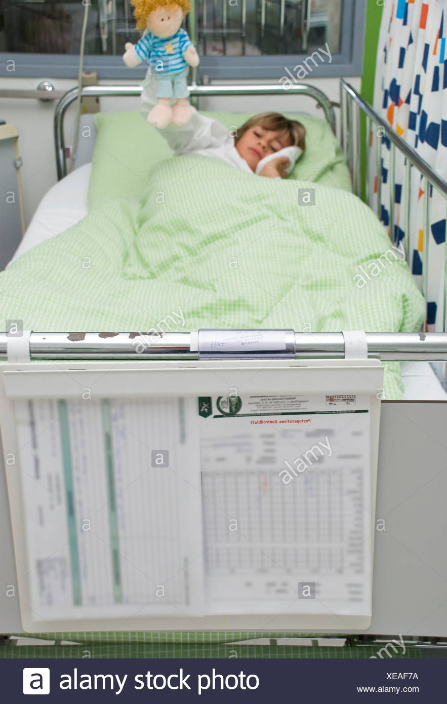 10 Years Old Boy Lying In A Bed Of A Children Hospital Cooling His