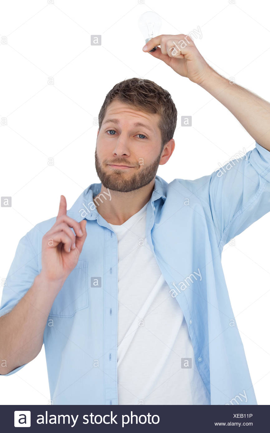 Cheerful Model Holding Light Bulb Above His Head On White