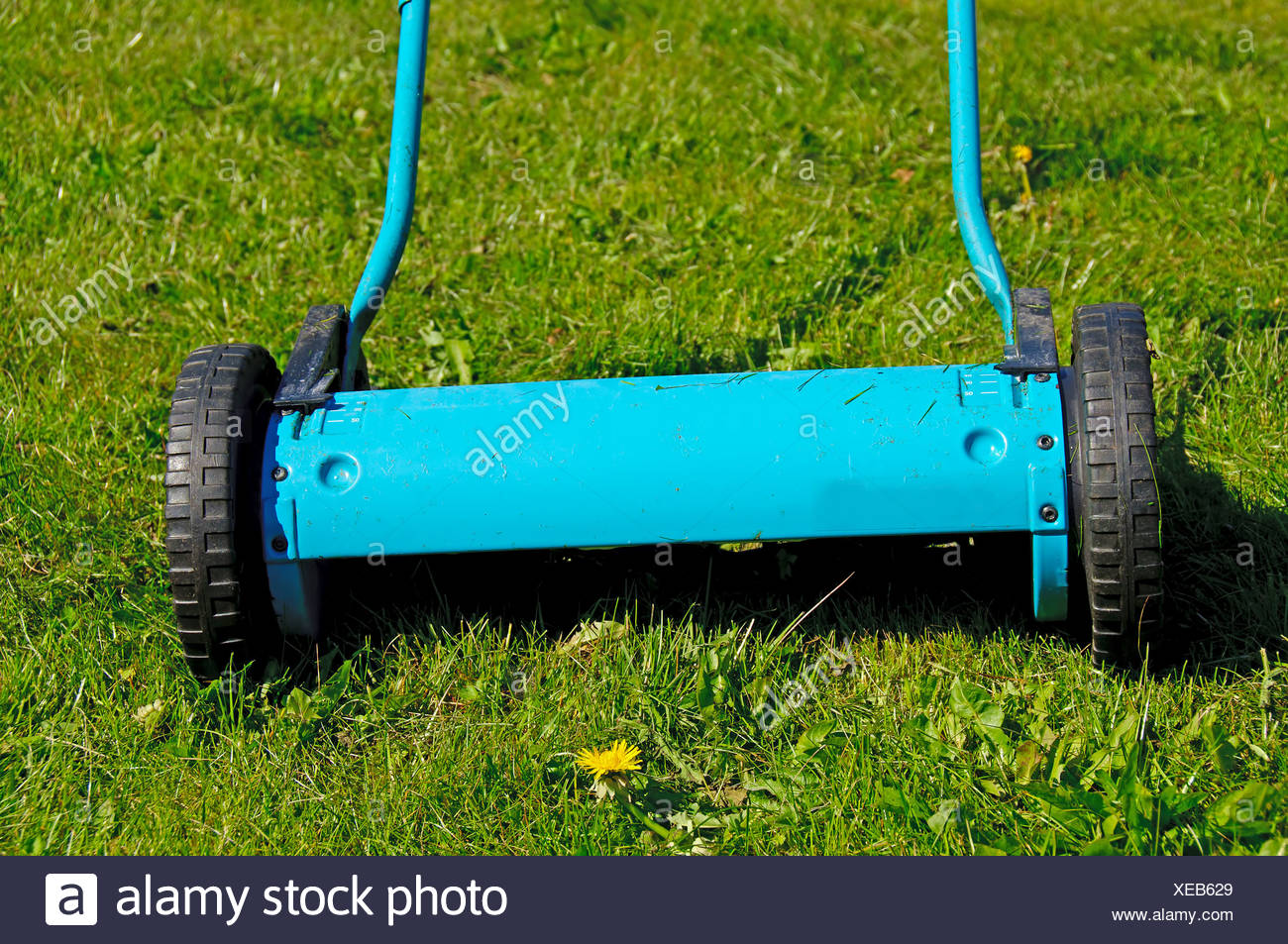 Old Fashioned Lawn Mower High Resolution Stock Photography and Images
