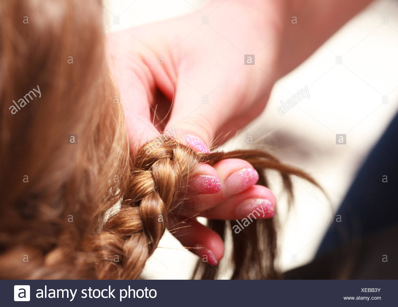 Hairdresser Plaiting Hair Little Girl Child In Hairdressing Beauty