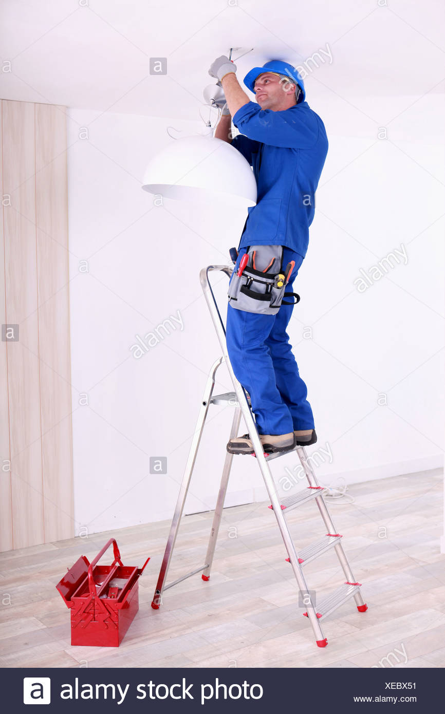 Electrician Hanging A Ceiling Light Stock Photo 284233069 Alamy