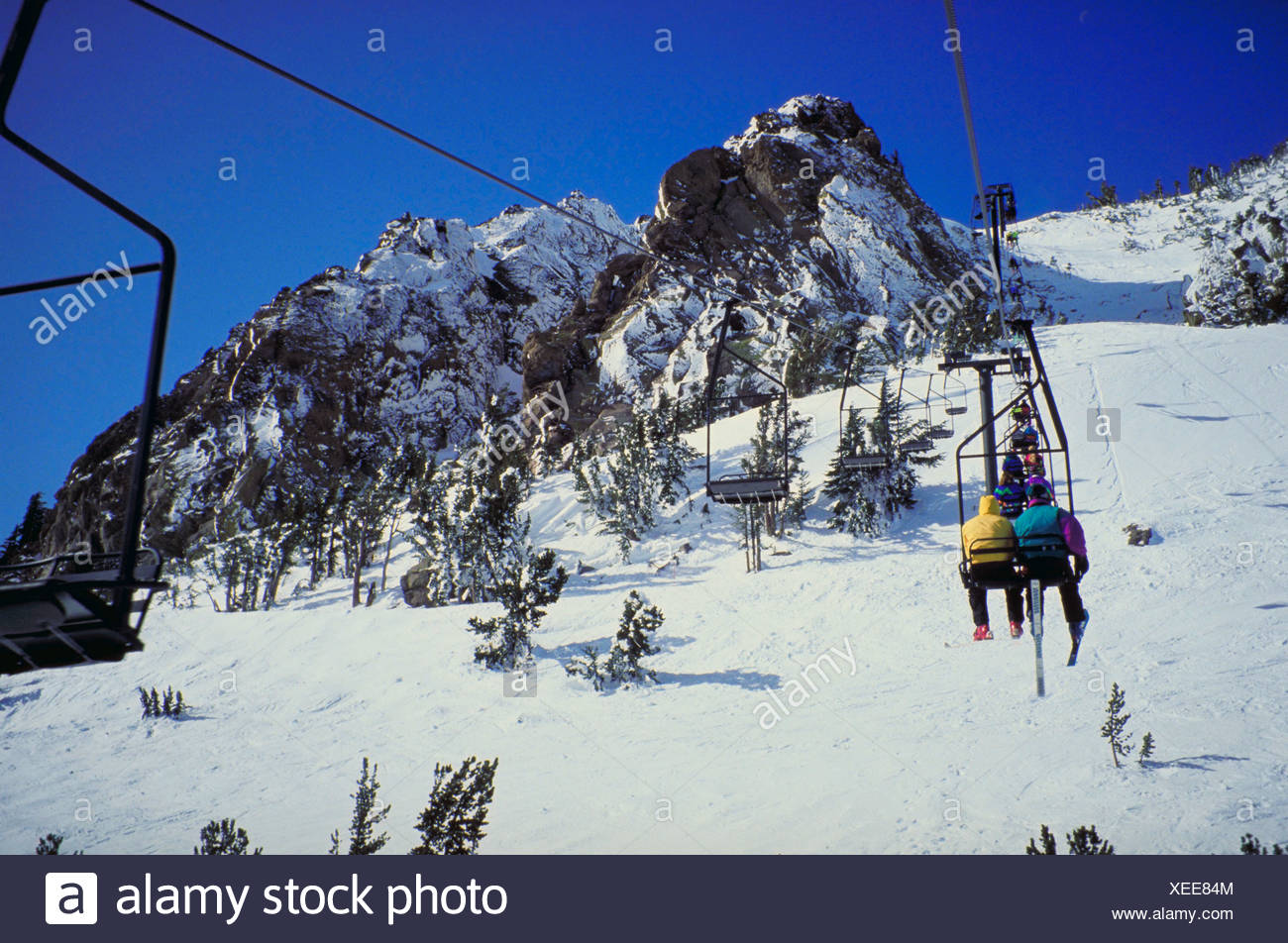Skiiers On A Chair Lift Mammoth Mountain California Usa