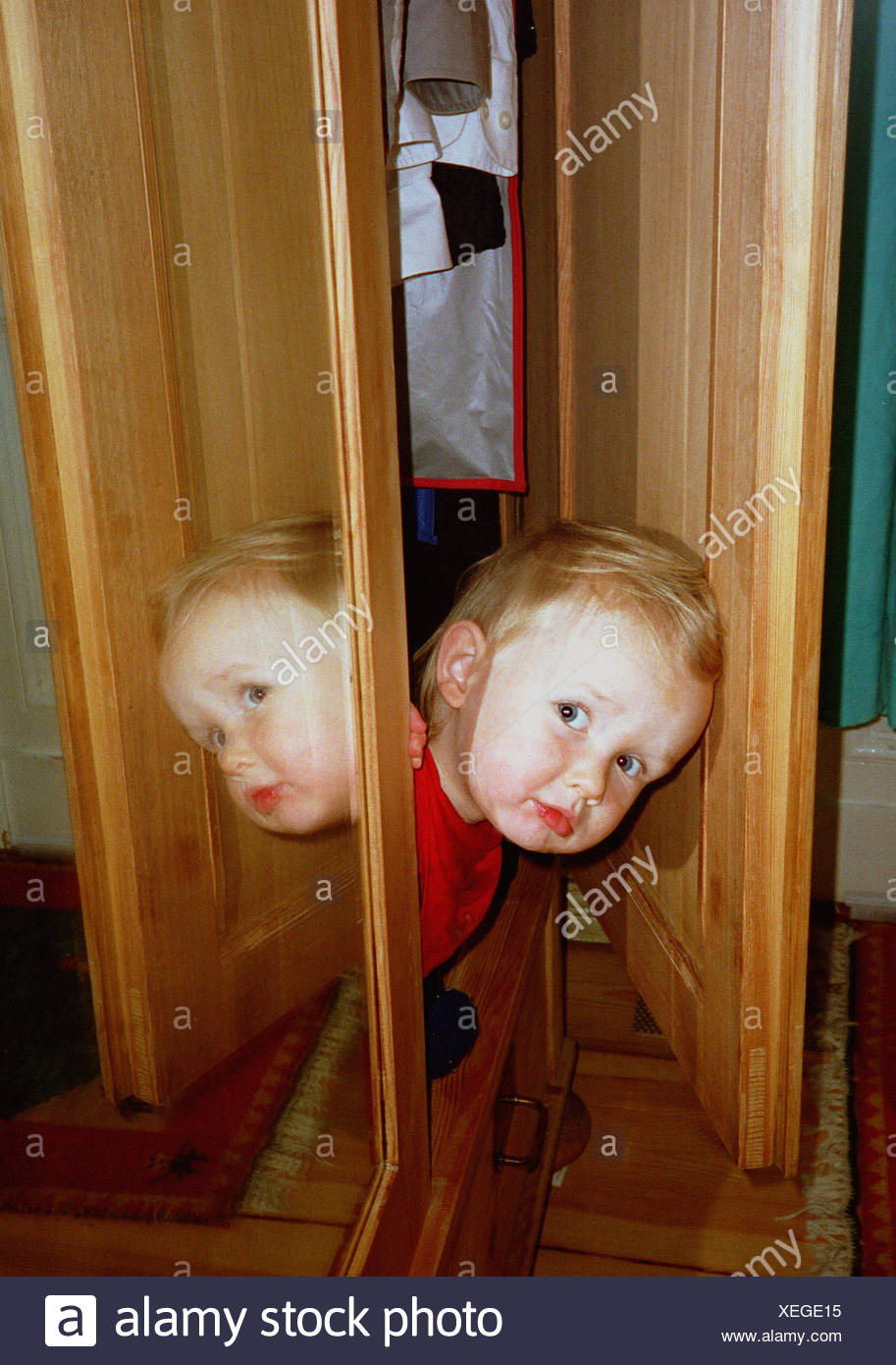 Child Playing In The Closet Stock Photo 284333313 Alamy