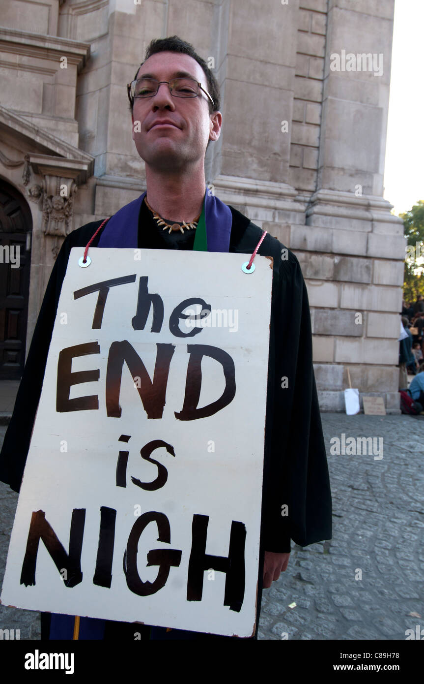 https://c8.alamy.com/comp/c89h78/occupy-london-man-with-sandwich-boards-saying-the-end-is-nigh-in-front-c89h78.jpg