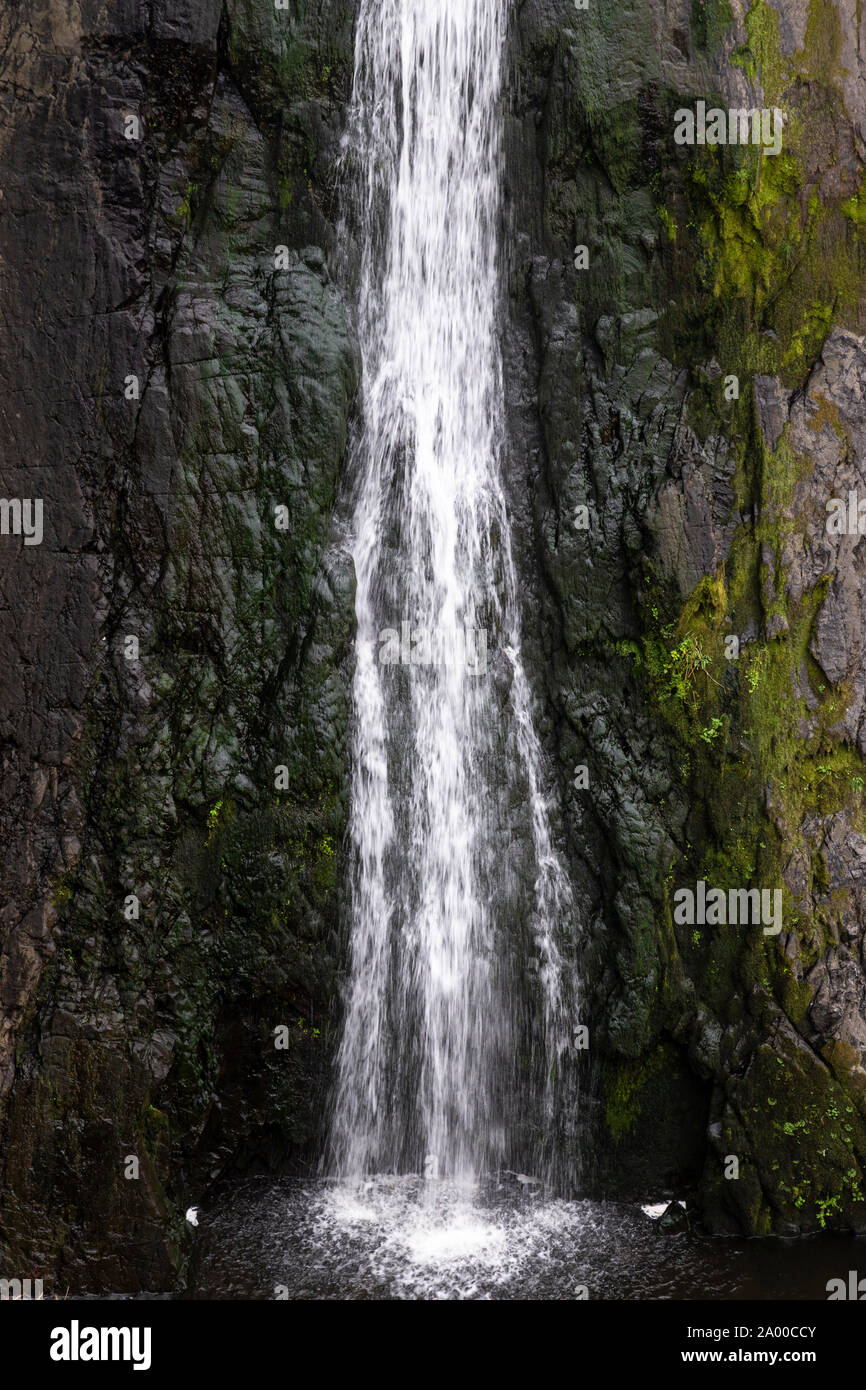 Die speke Mühle Mund Wasserfall bei Hartland Quay, Devon, England Stockfoto