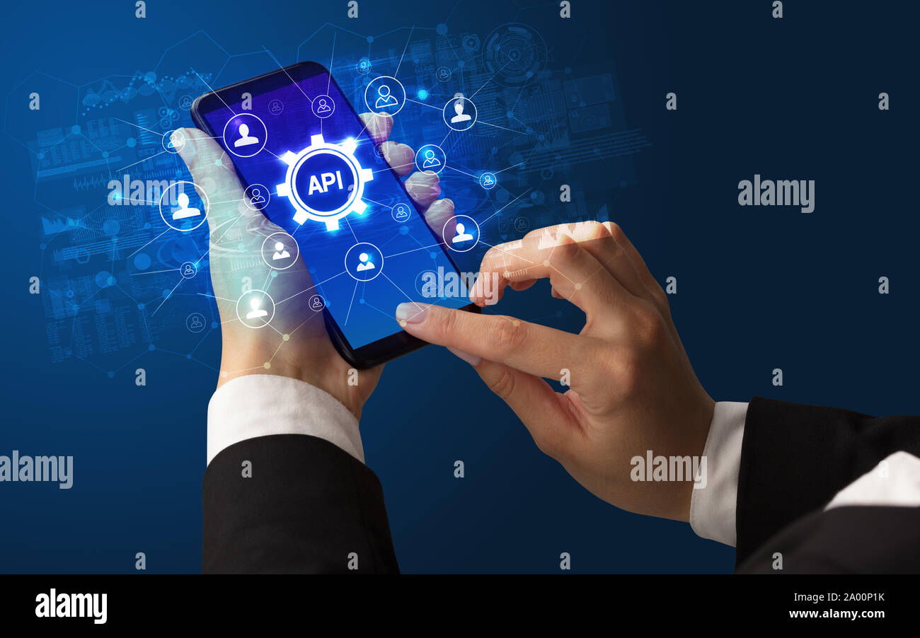 Weibliche hand Smartphone mit API Abkürzung, moderne Technologie Konzept Stockfoto