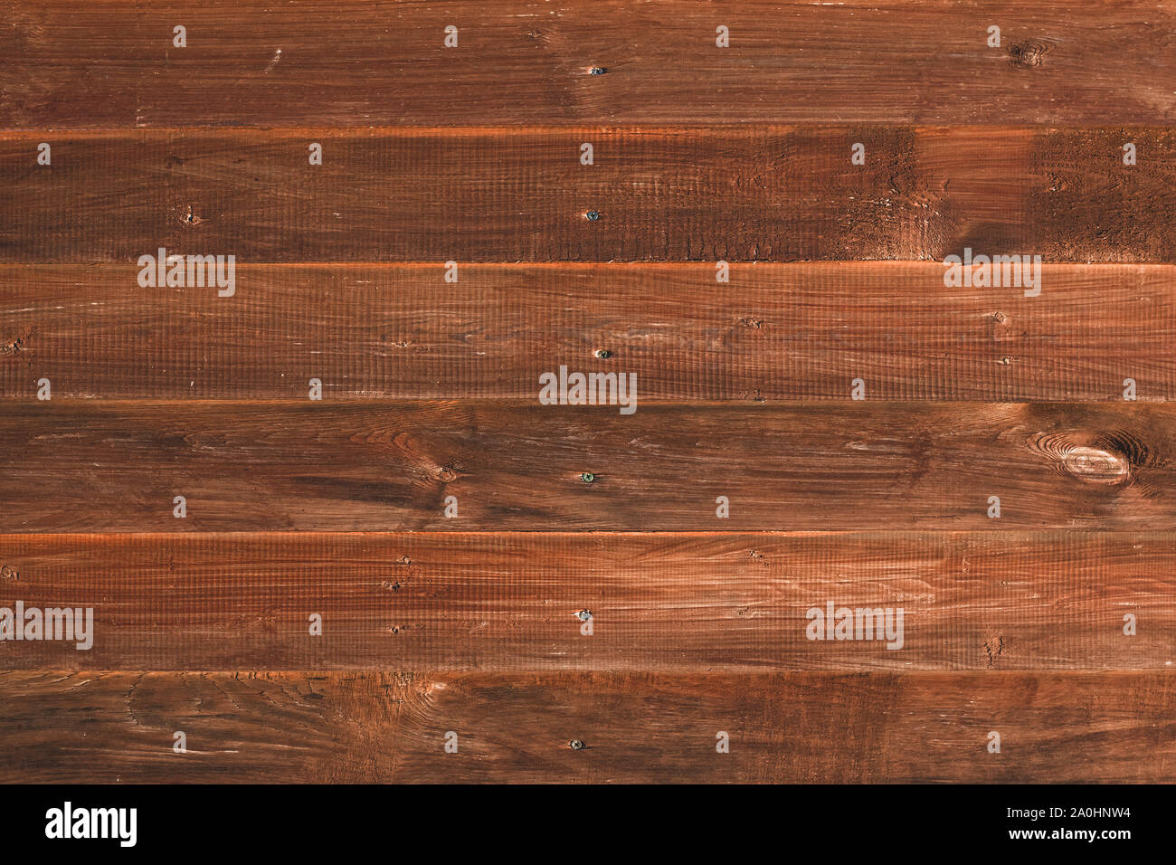 Textur von Brettern der roten Baum. Vintage Holzzaun, Schreibtisch Oberfläche. Natürliche Farbe. Verwittertes Holz, Hintergrund. Alte Holzbohlen. Muster der roten Stockfoto