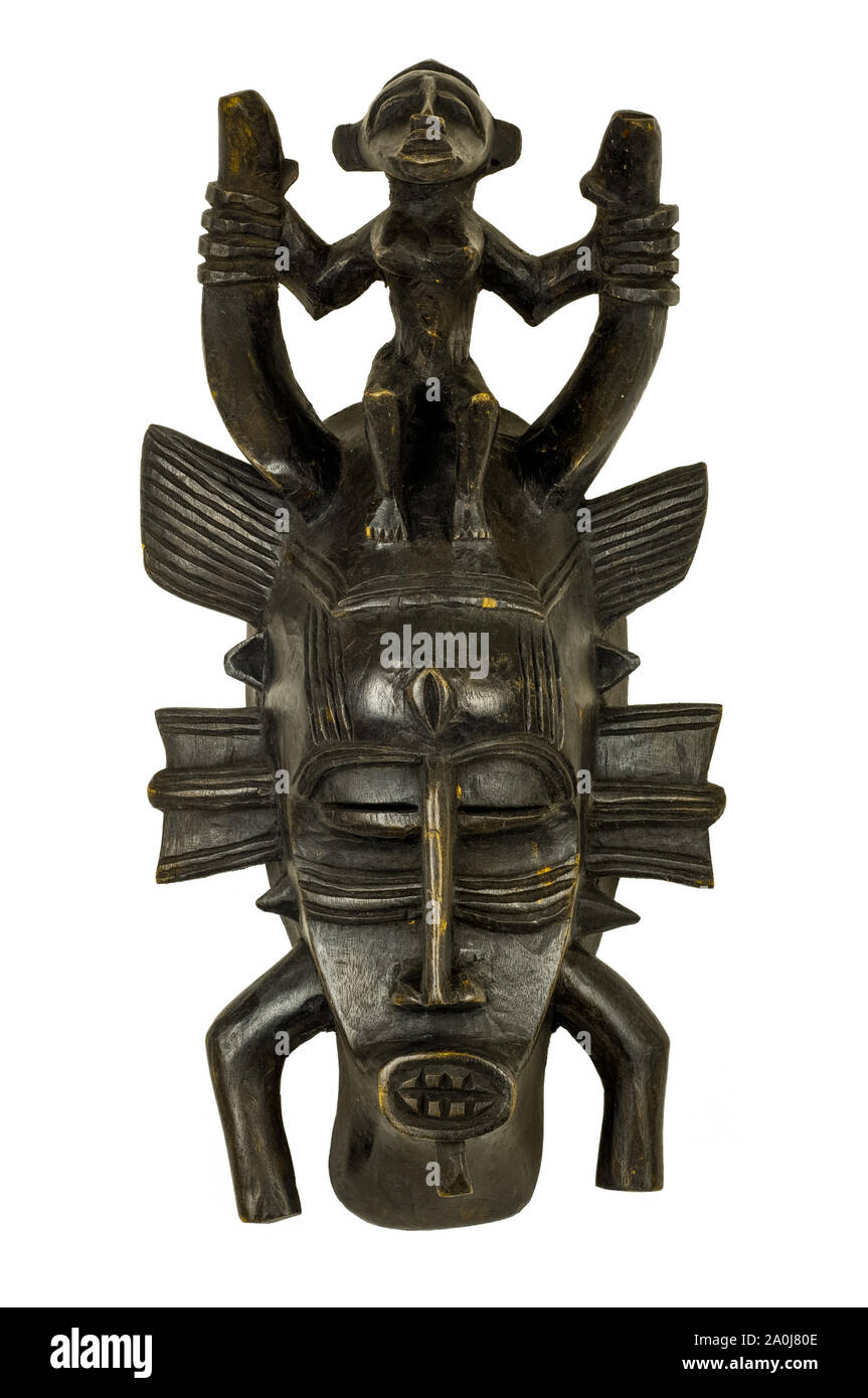 Senufo Maske aus Westafrika, in Holz isoliert auf weißem geschnitzt. Stockfoto