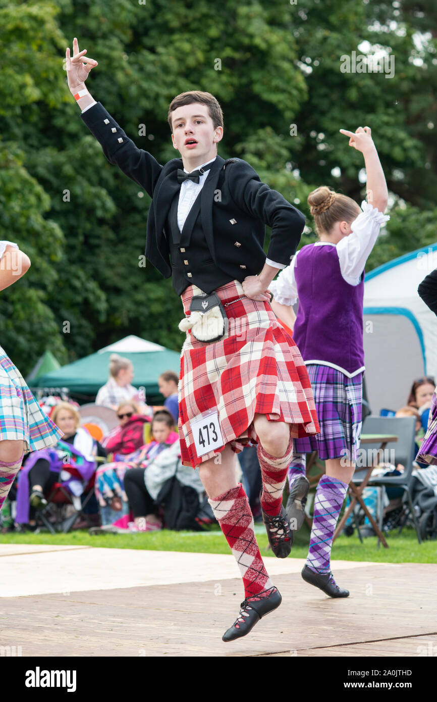 Highland dancing Teenager an der Highland Games in Peebles. Peebles, Scottish Borders, Schottland Stockfoto