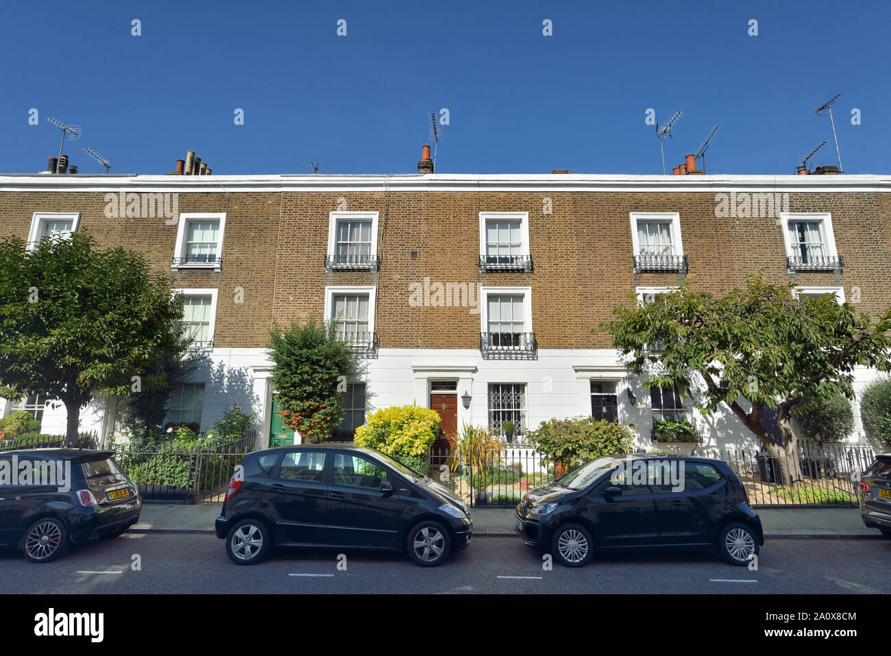 Reihenhäuser mit Stuck untere Fassade, Christchurch Street, Chelsea, London, Vereinigtes Königreich Stockfoto