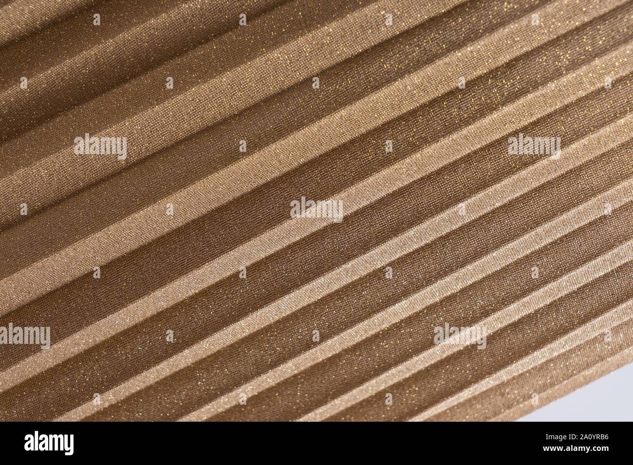 Plissee Golden Rock. Abstrakte detail. Nähe zu sehen. Schönen Hintergrund. Bild horizontal. Stockfoto