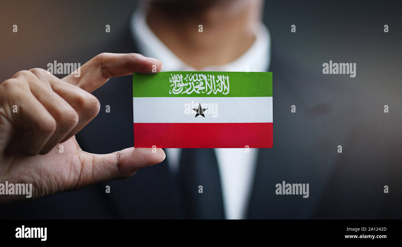 Geschäftsmann Holding Karte von Somaliland Flagge Stockfoto