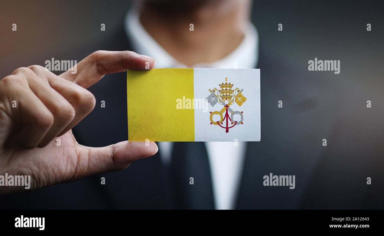 Geschäftsmann Holding Karte von Vatikanstadt Flagge Stockfoto