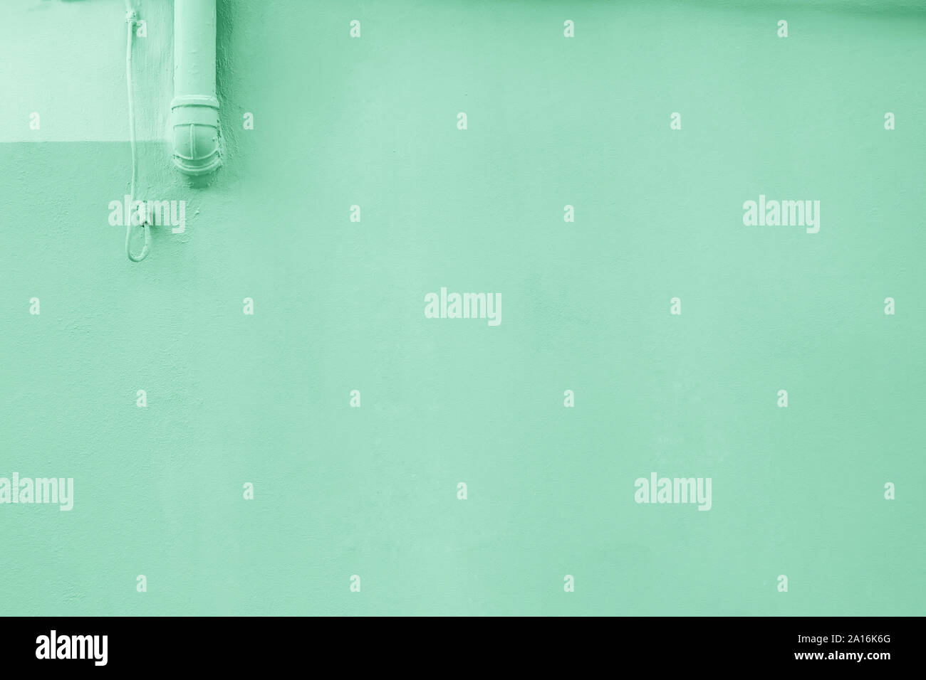 Wand mit Minze oder grün gefärbt. Stockfoto