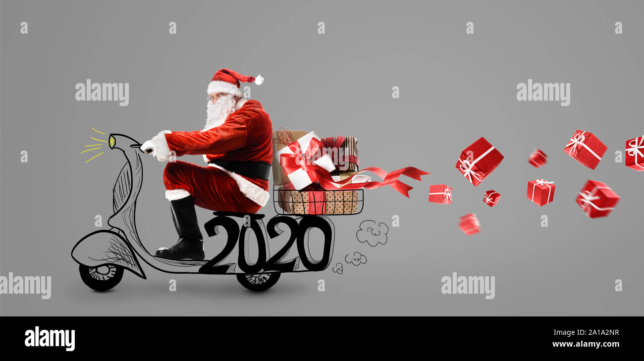 Weihnachtsmann auf Roller Stockfotografie - Alamy