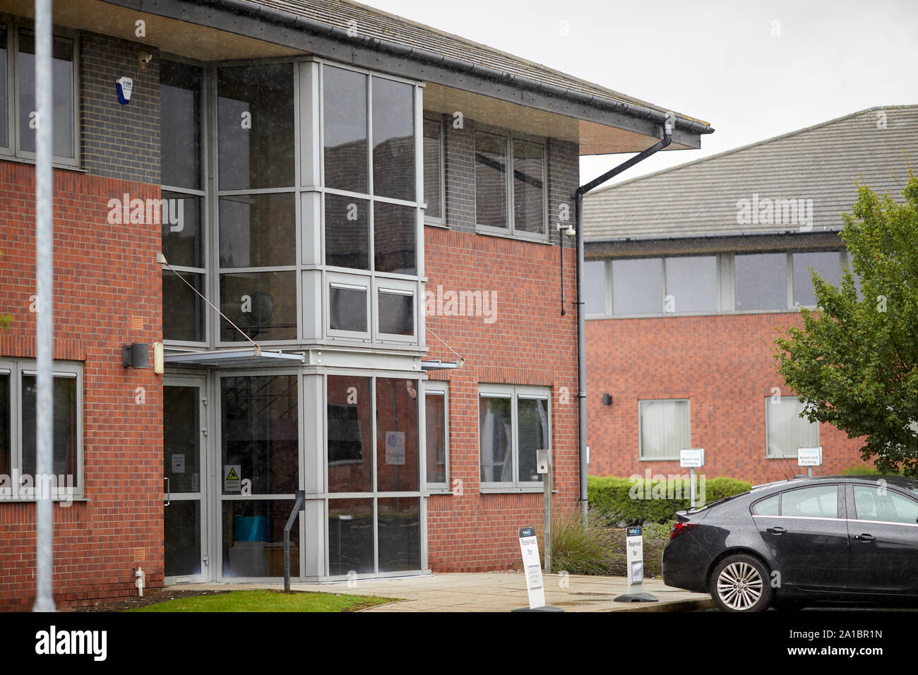 Parken Private Parkplätze Auge Firma Eaton Ave, Buckshaw Village, Chorley Stockfoto