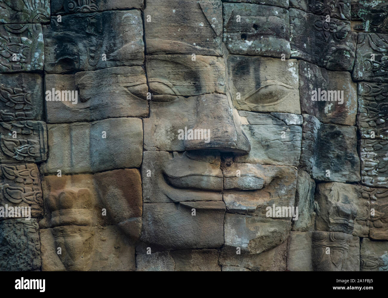 Geschnitzte Gesicht an Angkor Wat, die wichtigsten historischen Sehenswürdigkeiten von Kambodscha Stockfoto