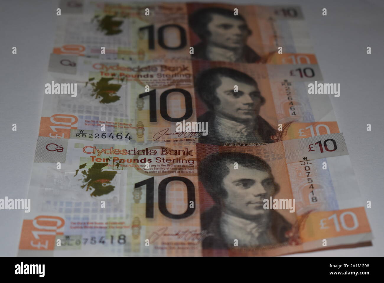 Clydesdale Schottischen £ 10 Banknoten auf einem weißen/grauen Hintergrund mit einem Bild von Robert Burns auf der Vorderseite. Zehn Pfund Sterling. Stockfoto