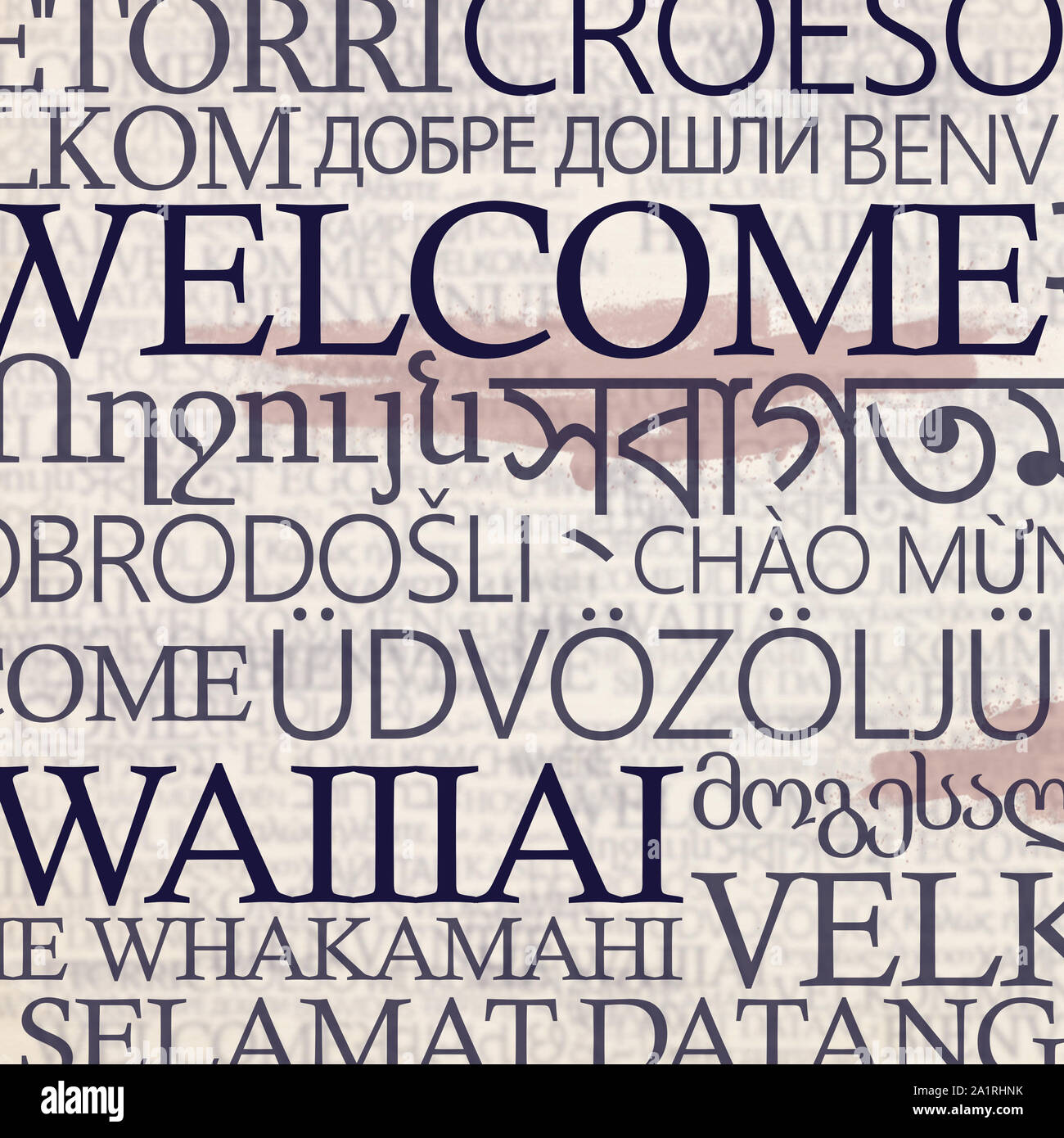 Multinationale stand mit Wort herzlich Willkommen in verschiedenen Sprachen Stockfoto