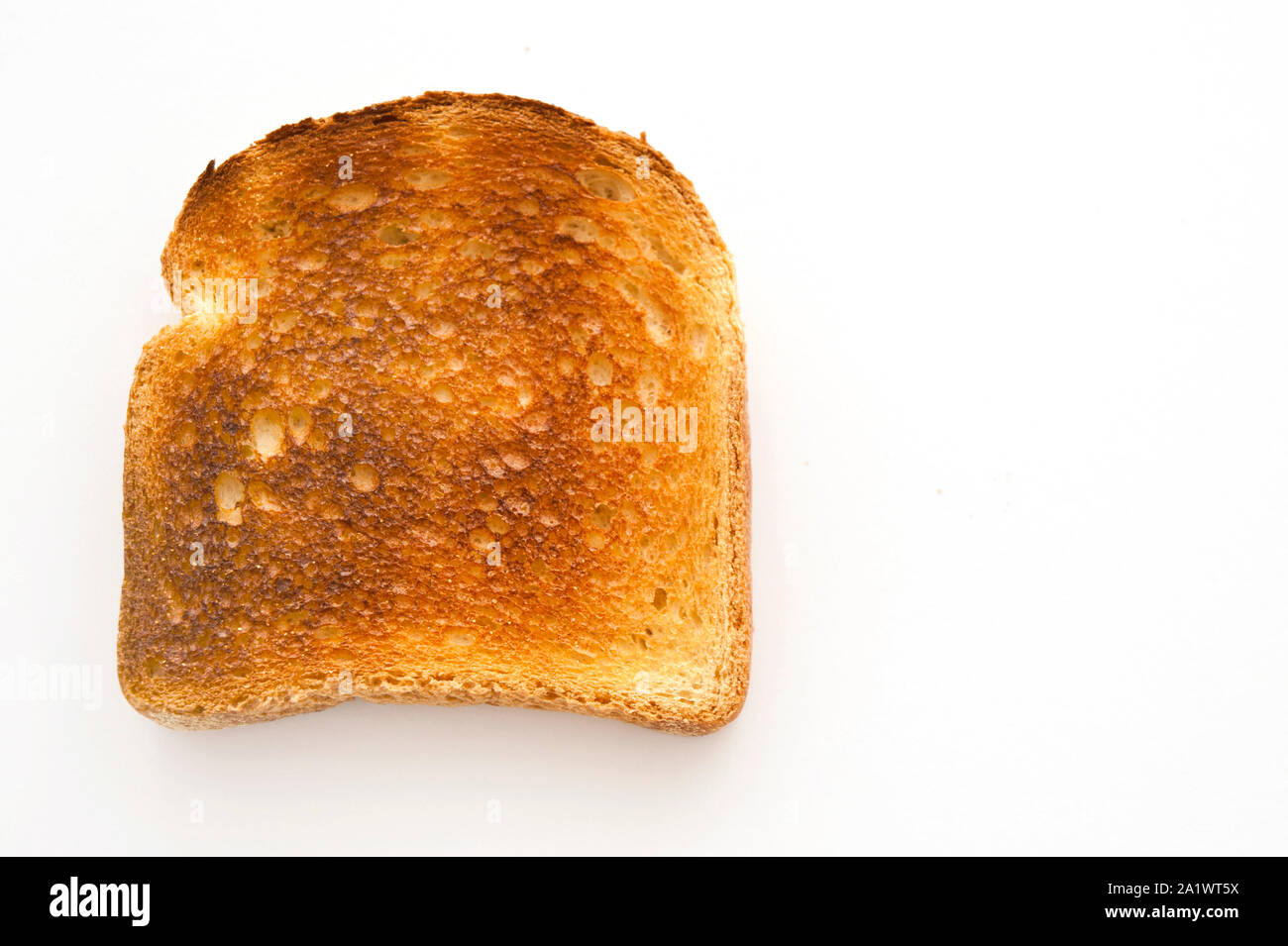 Eine Scheibe Toast Brot brüniert, isoliert Stockfoto