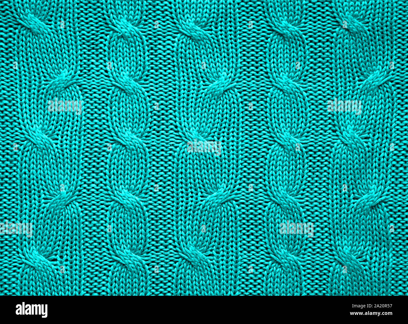 Gestrickte Textur der türkise Farbe. Hintergrund für einen Urlaub. Close-up. Stockfoto