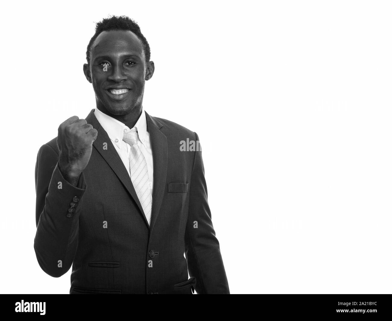 Junge glücklich schwarzen afrikanischen Geschäftsmann suchen motiviert Stockfoto