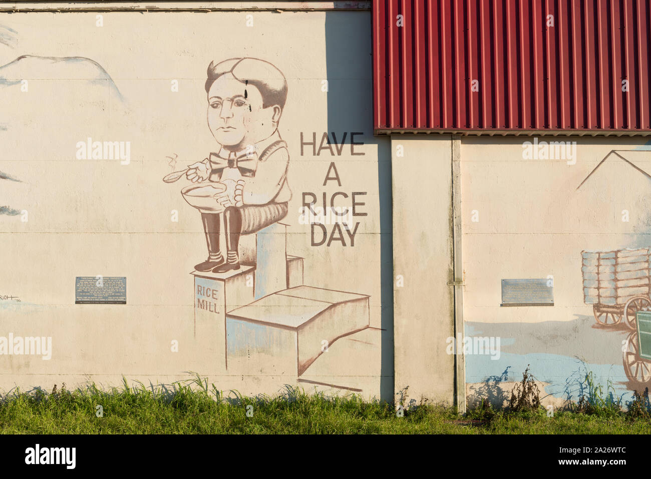 Teil einer Wandmalerei (haben eine Reis Tag) von Dayton Wodrich auf Gebäude in El Campo, einer Stadt in Wharton County in der Mid-Gulf Region von Texas. Die Wortspiel bezieht sich auf die wichtigste Industrie der Gemeinschaft, die Verarbeitung von Reis, in den nahe gelegenen Feldern angebaut Stockfoto
