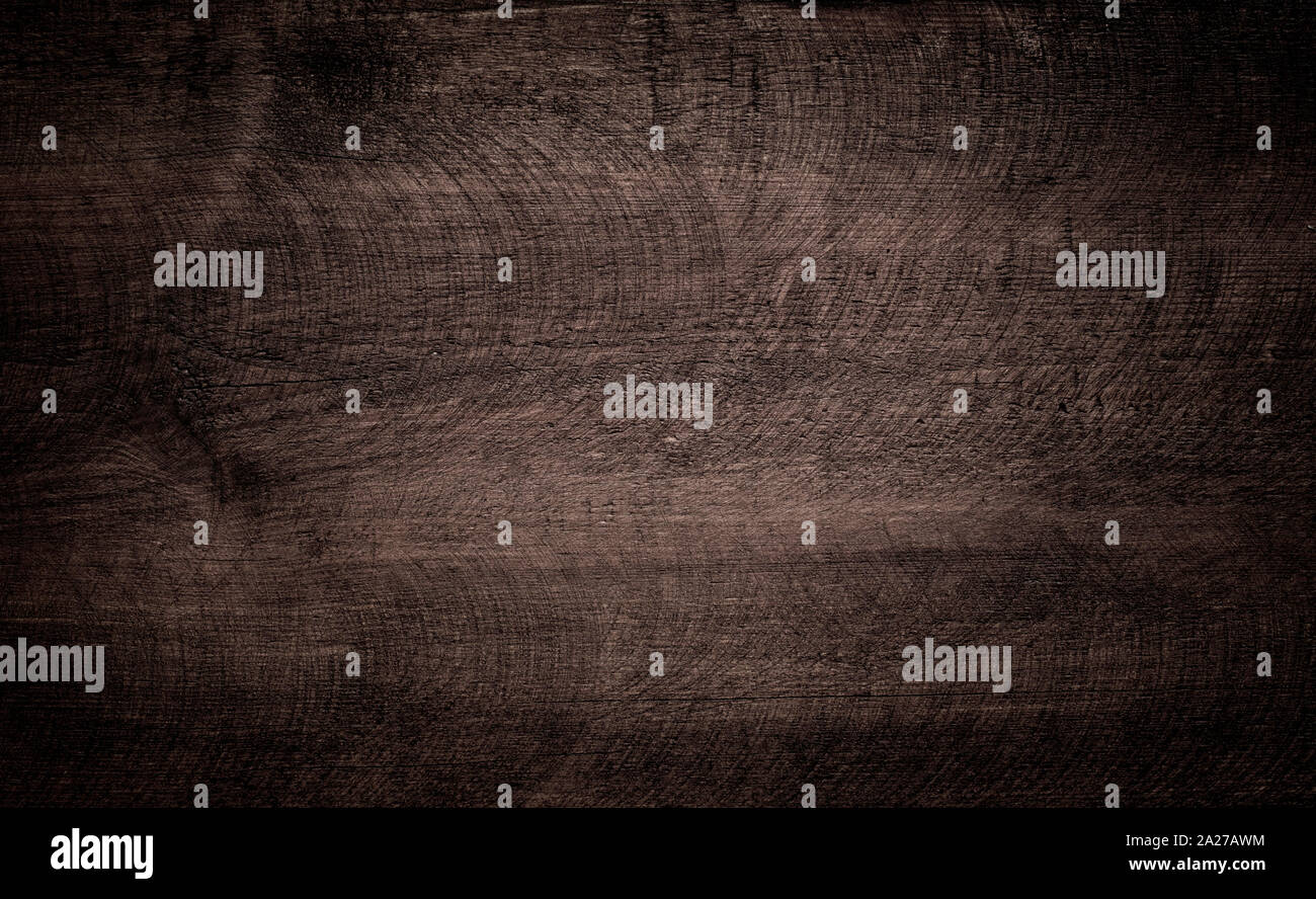 Dunkelbraun grunge zerkratzte Holz Schneiden, Hacken. Holz Textur Stockfoto