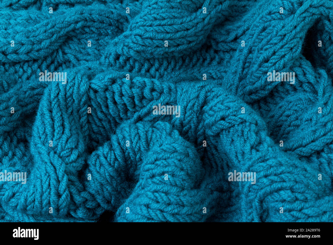 Textur von Türkis Gestrick Nahaufnahme Stockfoto