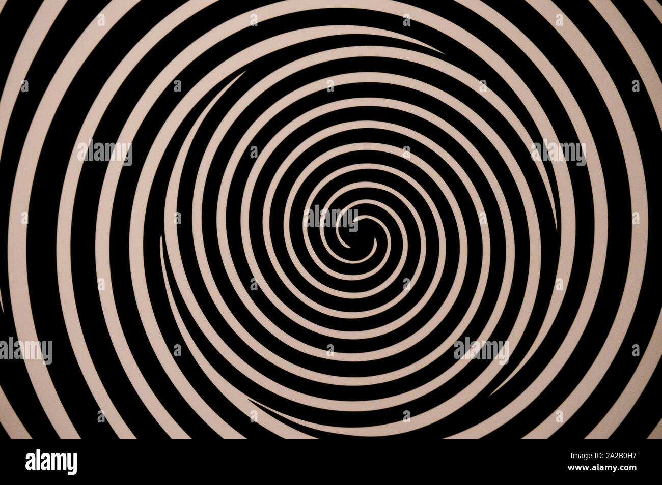 Optische Illusion, schwarz und weiß sich drehende Spiralen Stockfoto