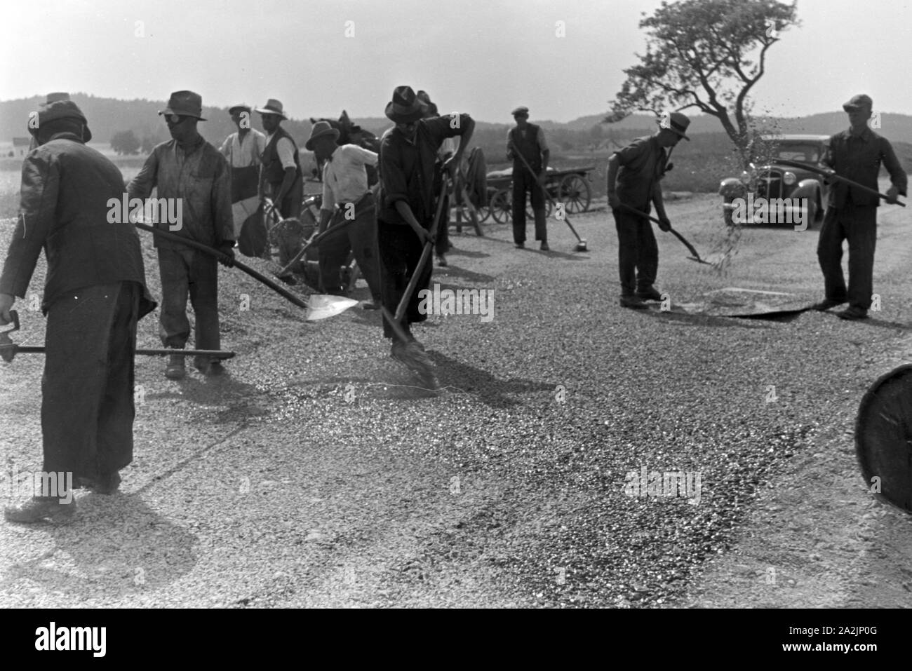 Männer bei der Arbeit, Deutsches Reich 30er Jahre. Männer an der Arbeit, Deutschland 1930. Stockfoto