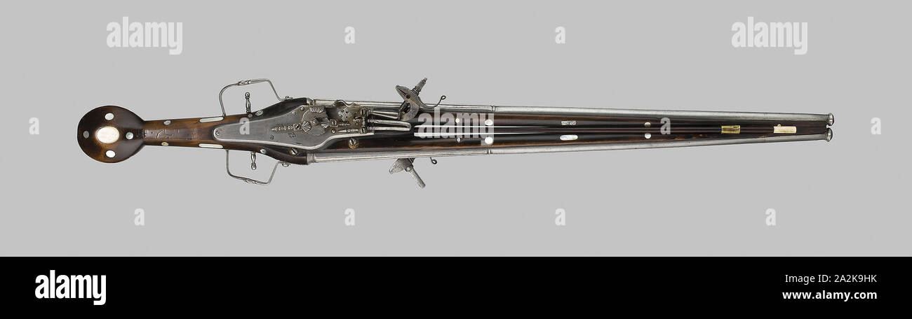 Double-Barreled Holster Pistole mit zwei Schlösser, C. 1610/20, Deutsch, Nürnberg, Nürnberg, Holz, Perlmutt, und Bügeleisen, L. 78 cm (30 3/4 in Stockfoto