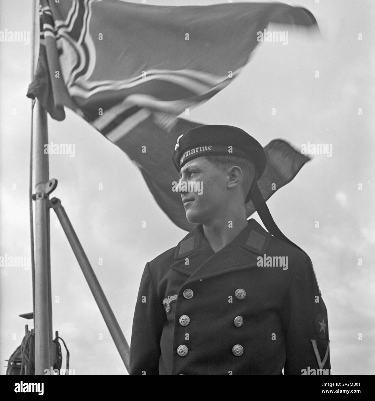 Original-Bildunterschrift: Porträt eines Matrosen der deutschen Kriegsmarine, Deutschland 1940er Jahre. Porträt eines Soldaten der Deutschen Marine, Deutschland 1940. Stockfoto