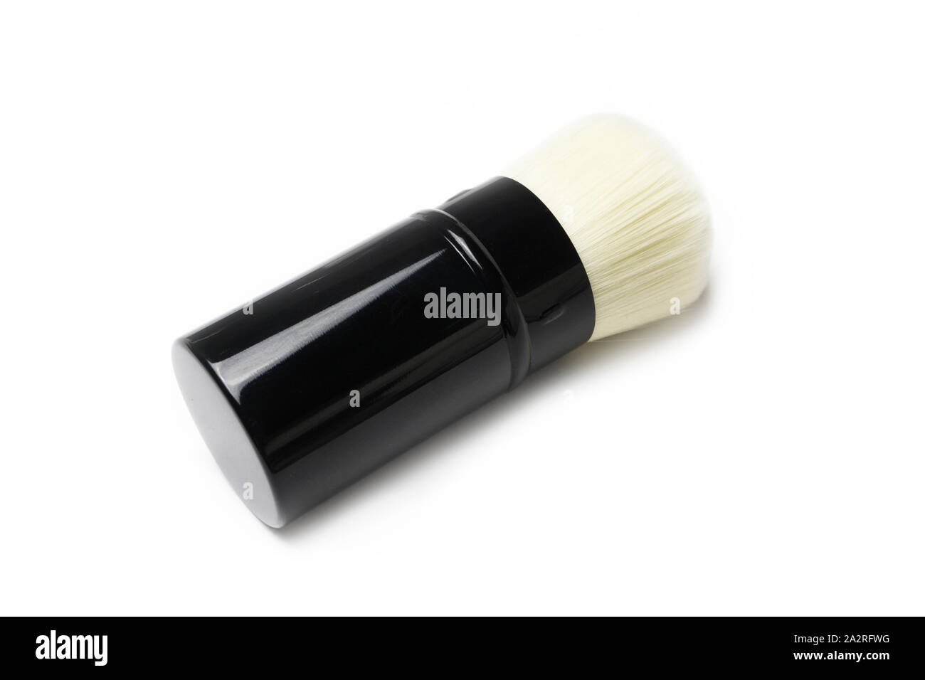 Make-up-Pinsel schließen bis auf weißem Hintergrund Stockfoto