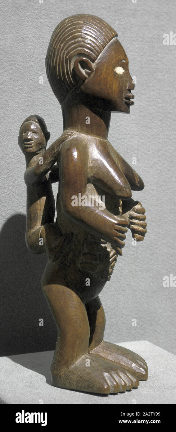 Weibliche Figur mit Kind, Bembe Leute, 20. Jahrhundert, Holz, Keramik, H: 8-1/4-in., Afrikanische Kunst Stockfoto