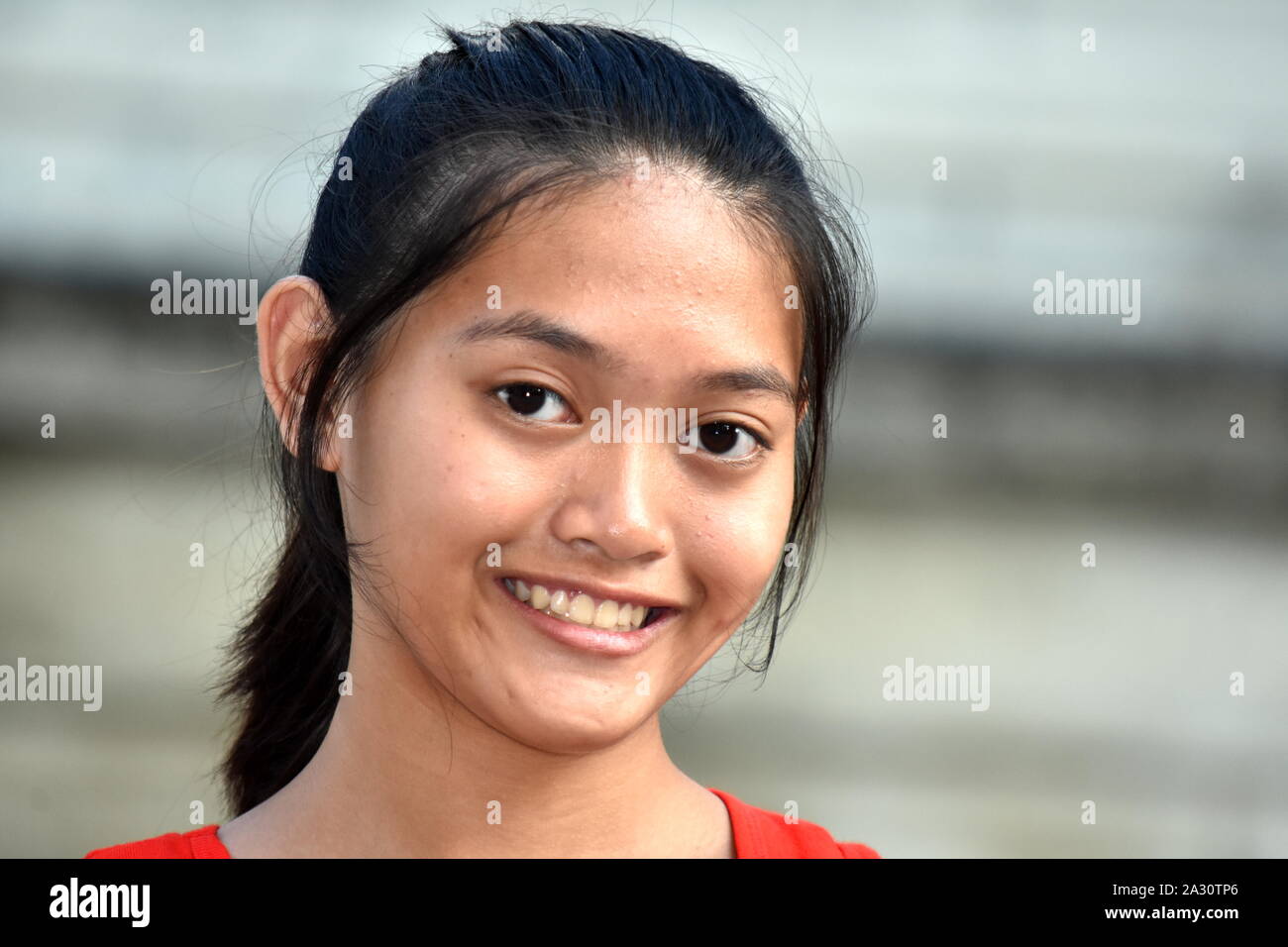 Eine Filipina weiblichen Lächelnd Stockfoto