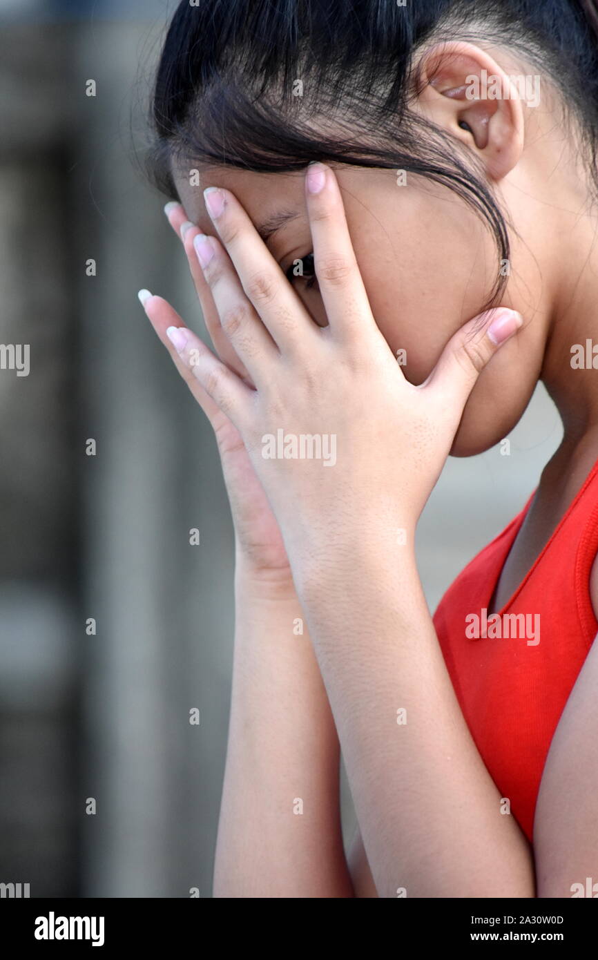 Eine Eine unglückliche Asiatische Person Stockfoto