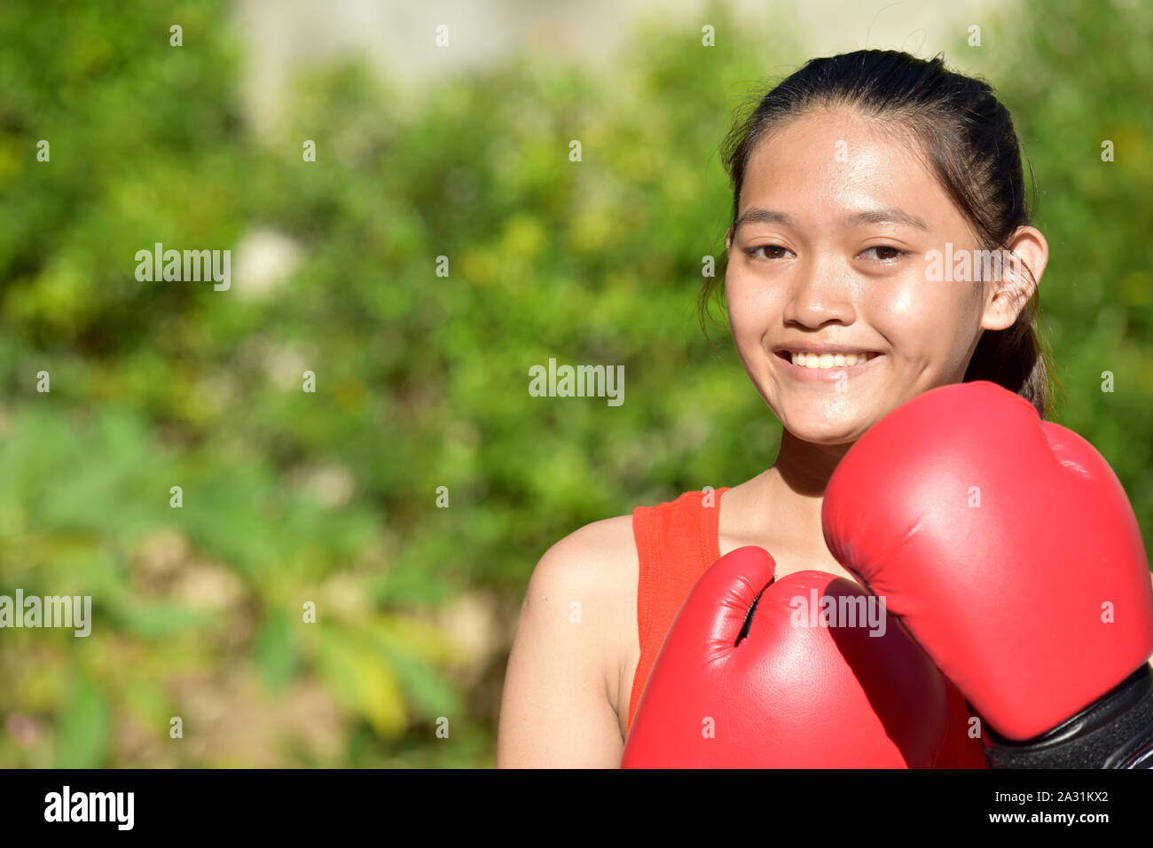 Weibliche Boxer und Glück Boxhandschuh Stockfoto