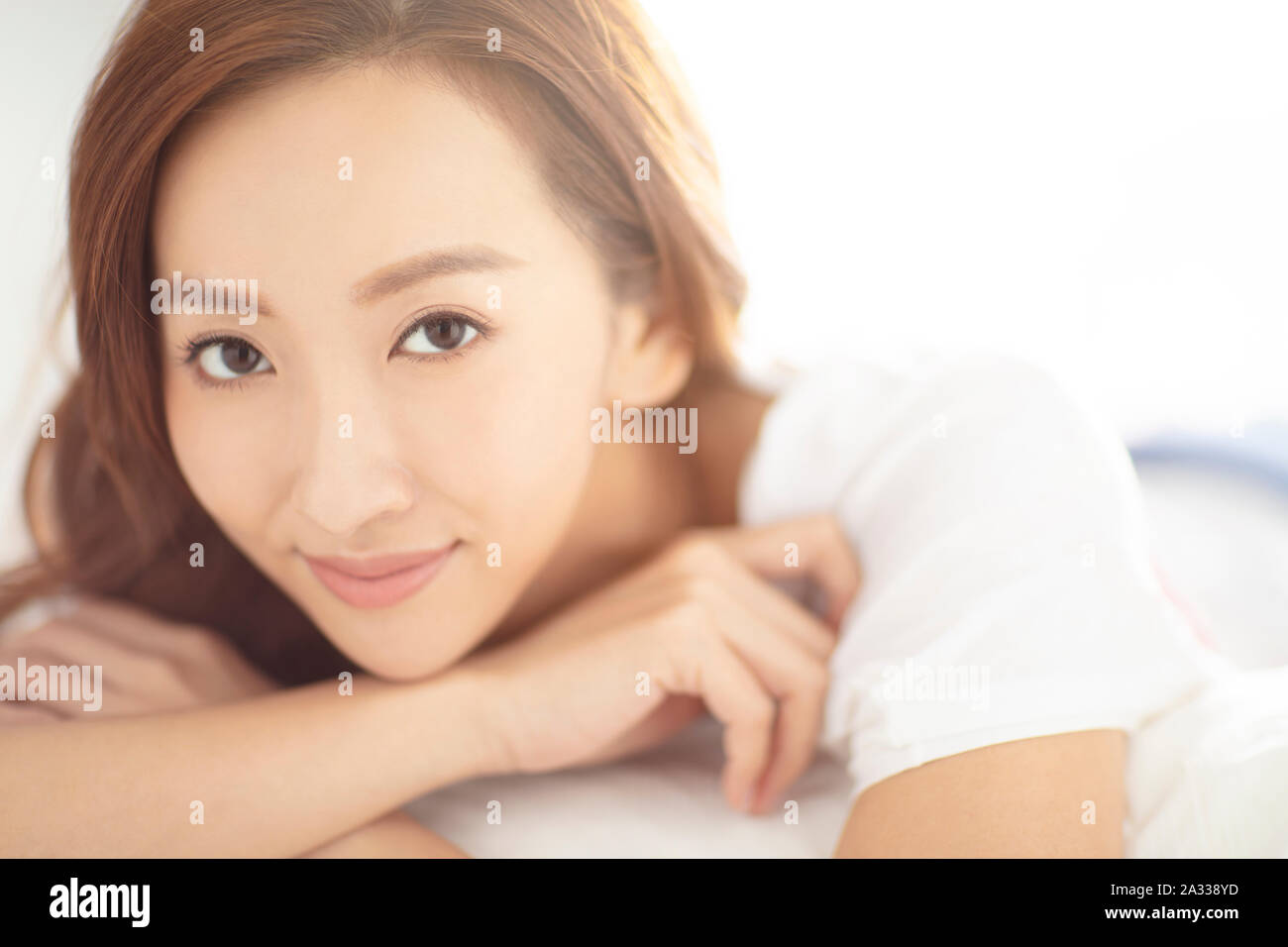 Closeup jungen asiatischen lächelnde Frau Gesicht Stockfoto