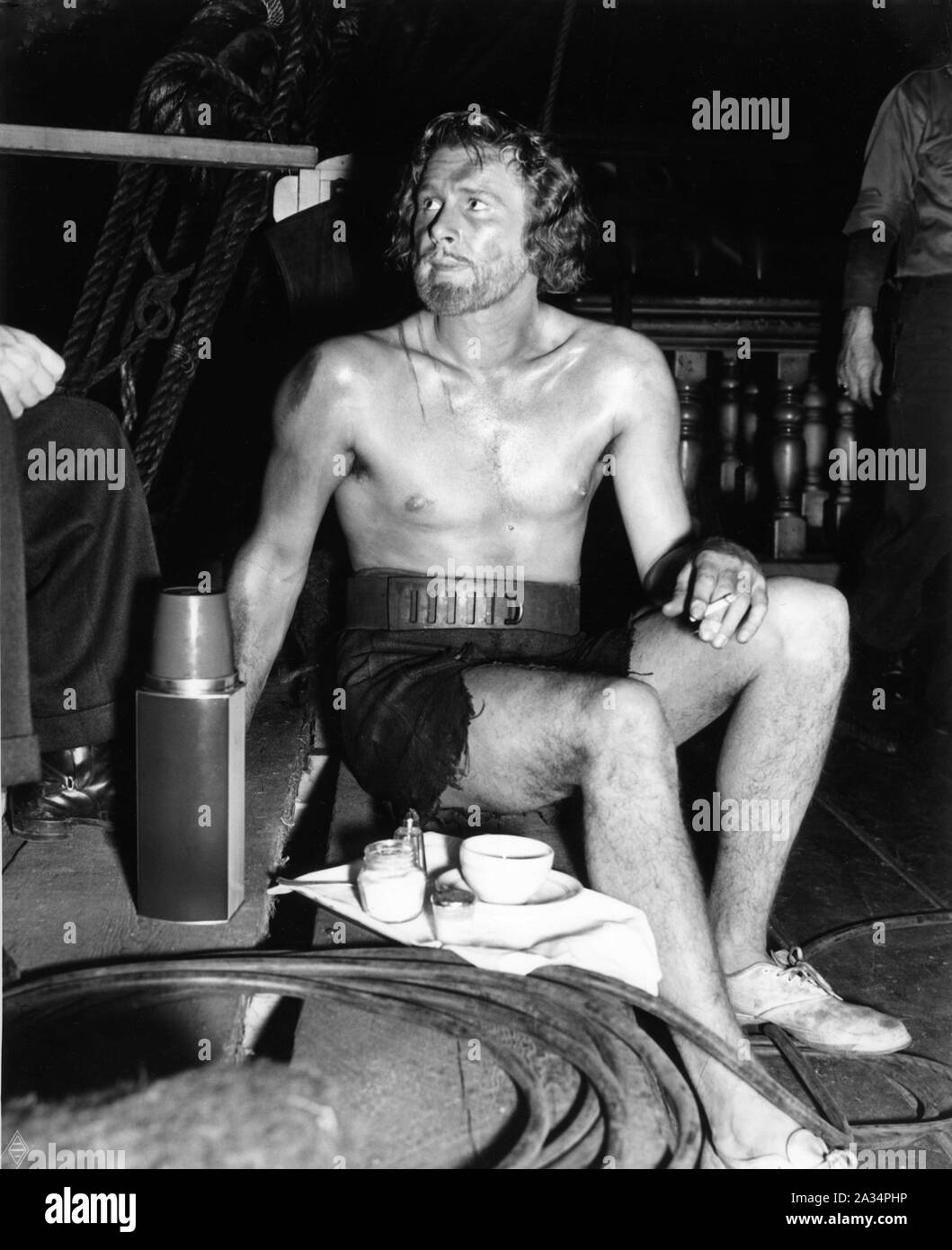 ERROL FLYNN als Captain Geoffrey Thorpe Kaffee Pause kostümierten als kombüse Slave auf ehrliche nimmt die SEA HAWK 1940 Regisseur Michael Curtiz Musik von Erich Wolfgang Korngold Warner Bros. Stockfoto