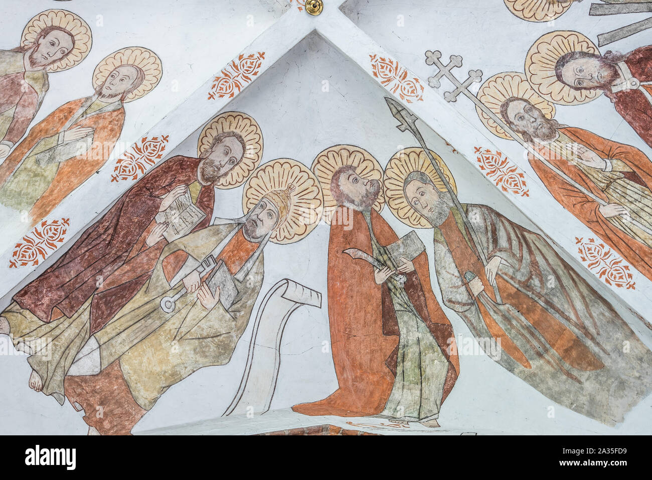 Wandbild der Vier Apostel mit ihren Symbolen, eine Wand - Malerei etwa ab dem Jahr 1500 in der Kirche St. Maria, Elsinore, Dänemark, 14. Mai 2019 Stockfoto