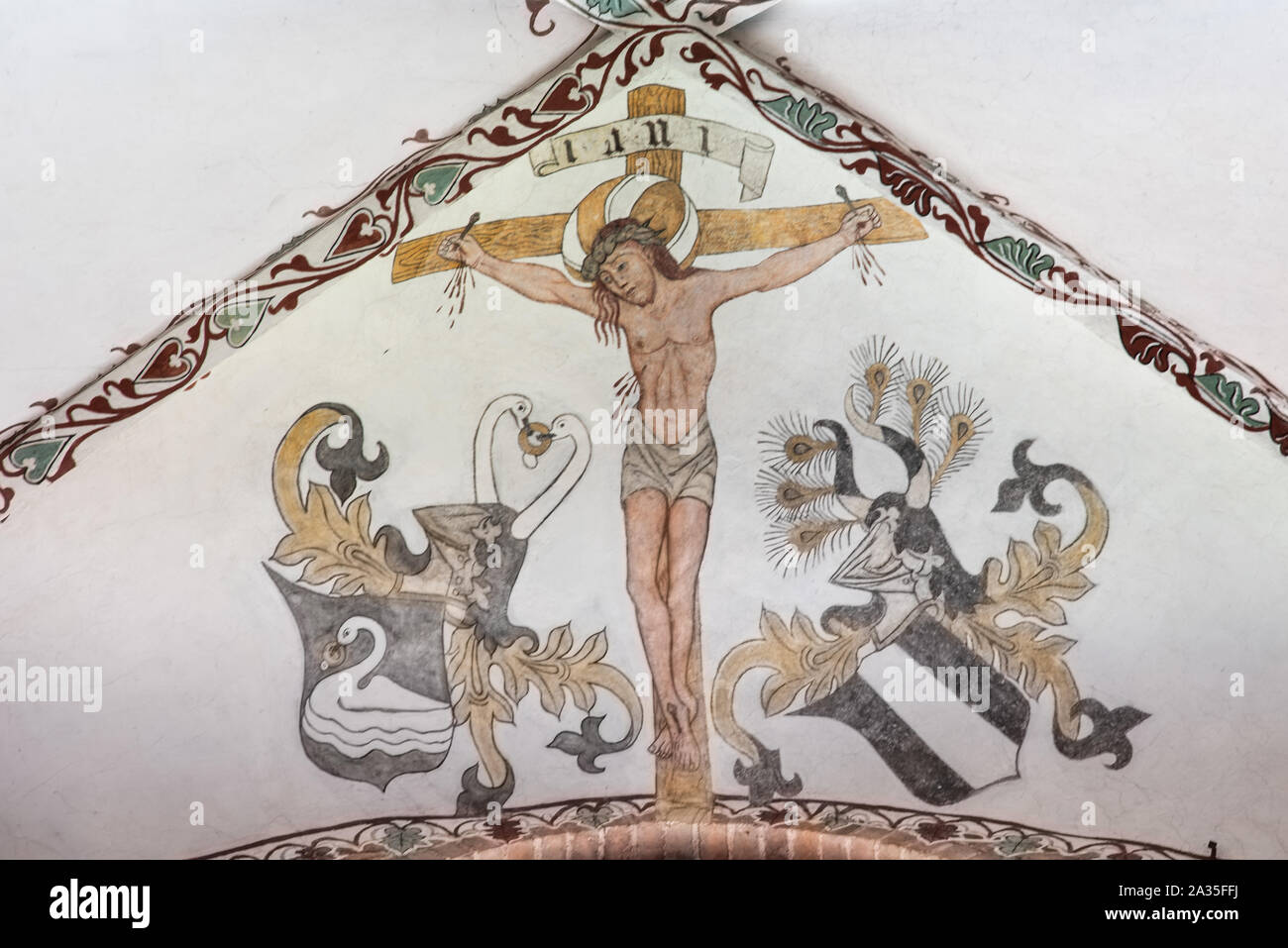 Die Kreuzigung Jesu am Karfreitag, ein Fresko, etwa ab dem Jahr 1500 in der Kirche St. Maria, Elsinore, Dänemark, 14. Mai 2019 Stockfoto