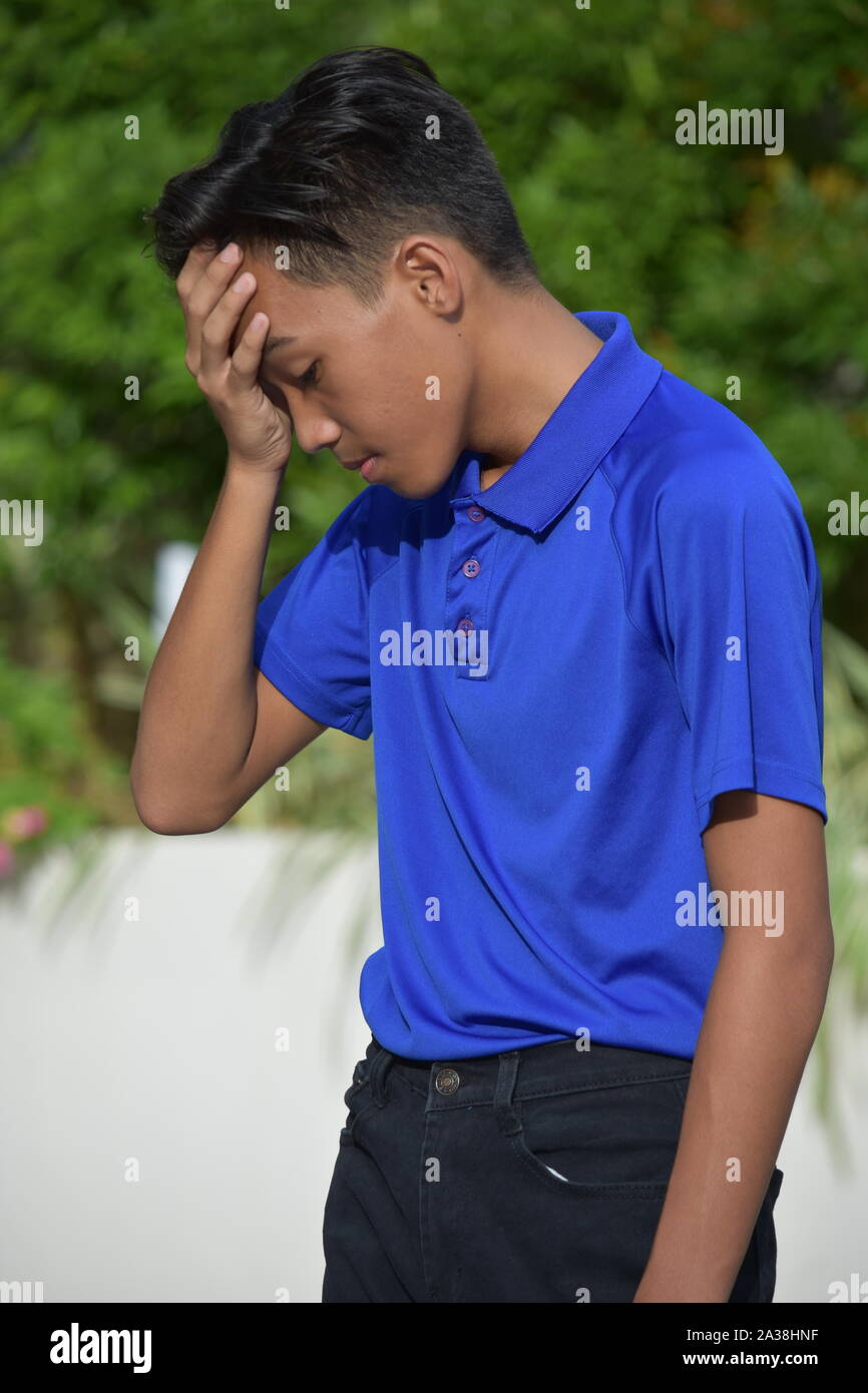Eine traurige Filipino Person Stockfoto