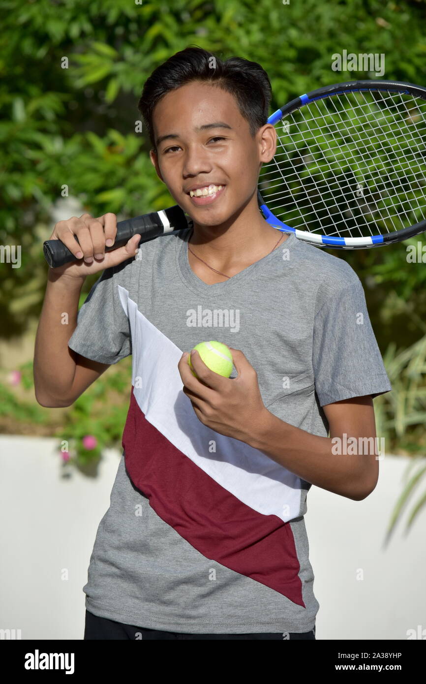 Tennis Player und Glück mit Tennisschläger Stockfoto