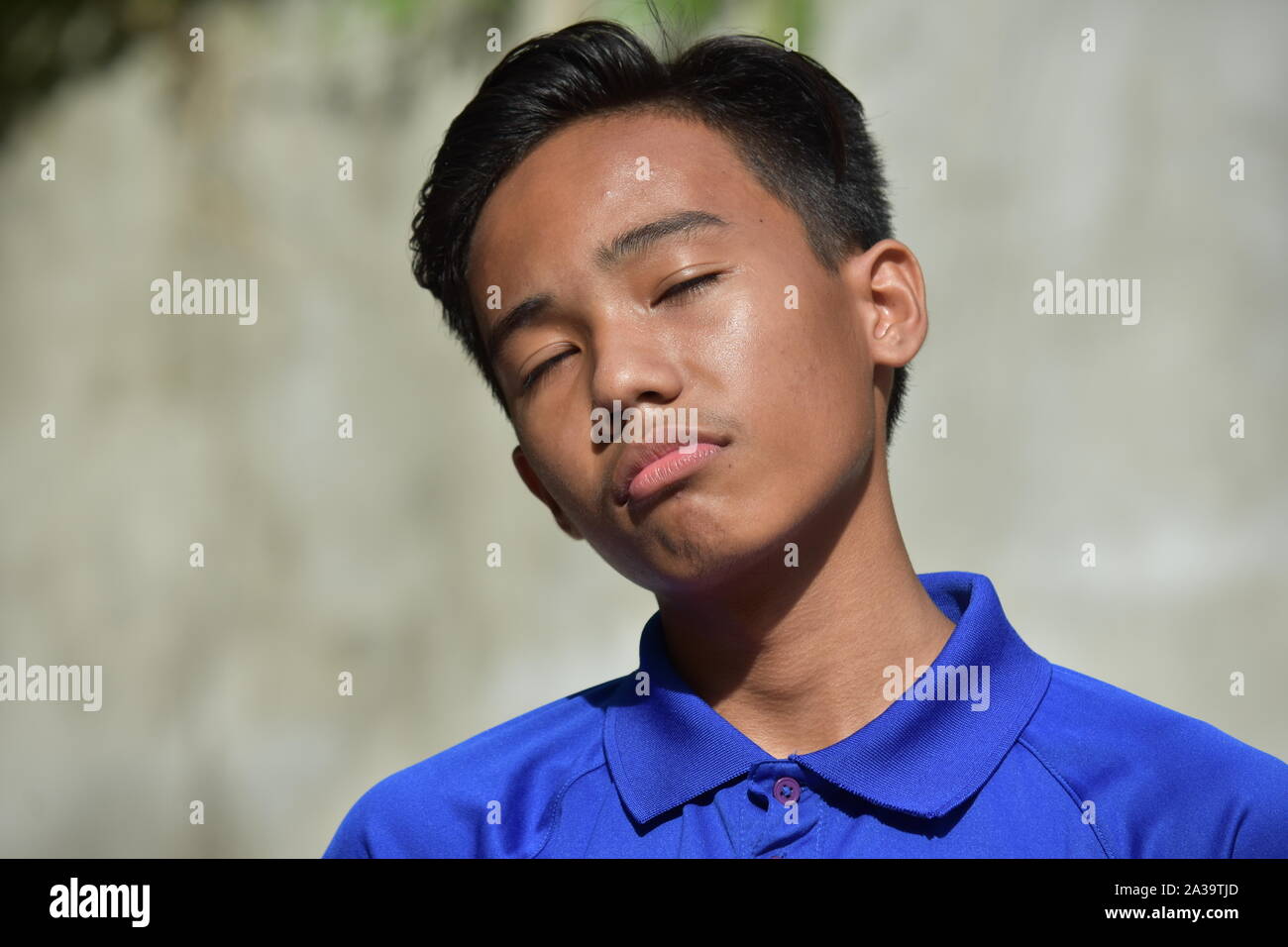 Eine gefühllose Philippinischen Jungen Stockfoto