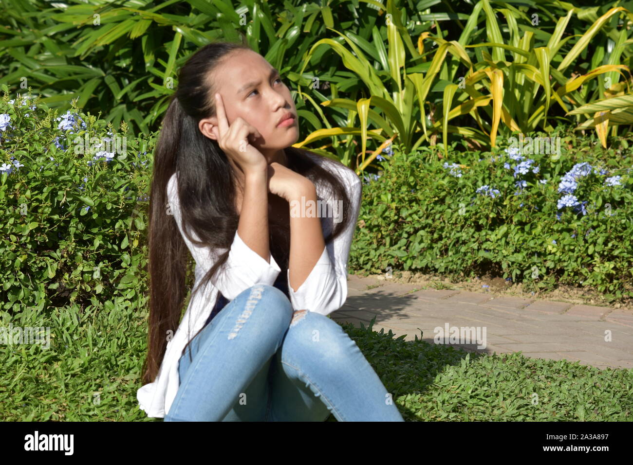 Ein denken Cute Filipina Teenager Stockfoto