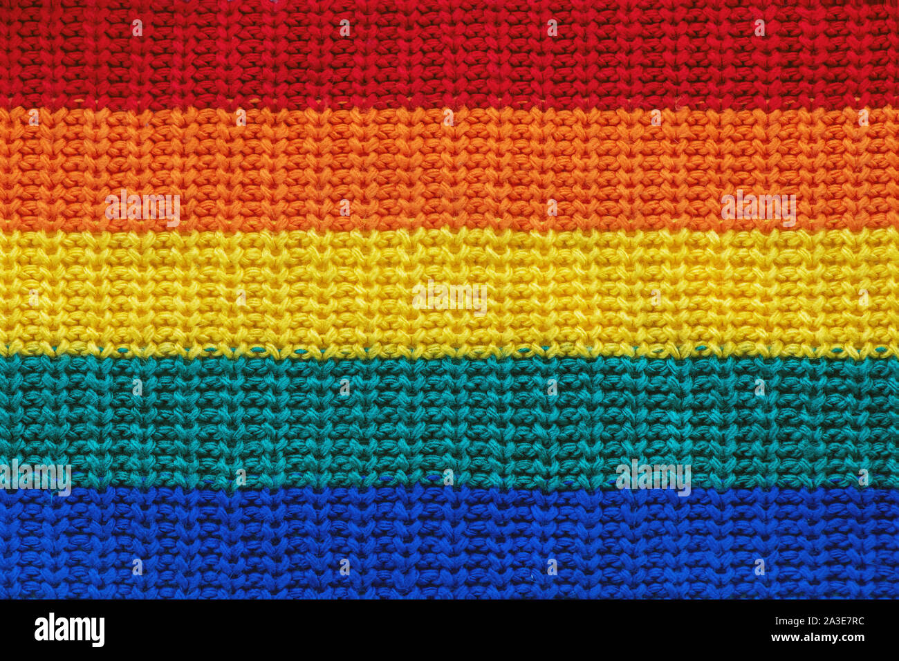 Nahaufnahme der hellen Pullover Muster in Regenbogen Farben. Stockfoto