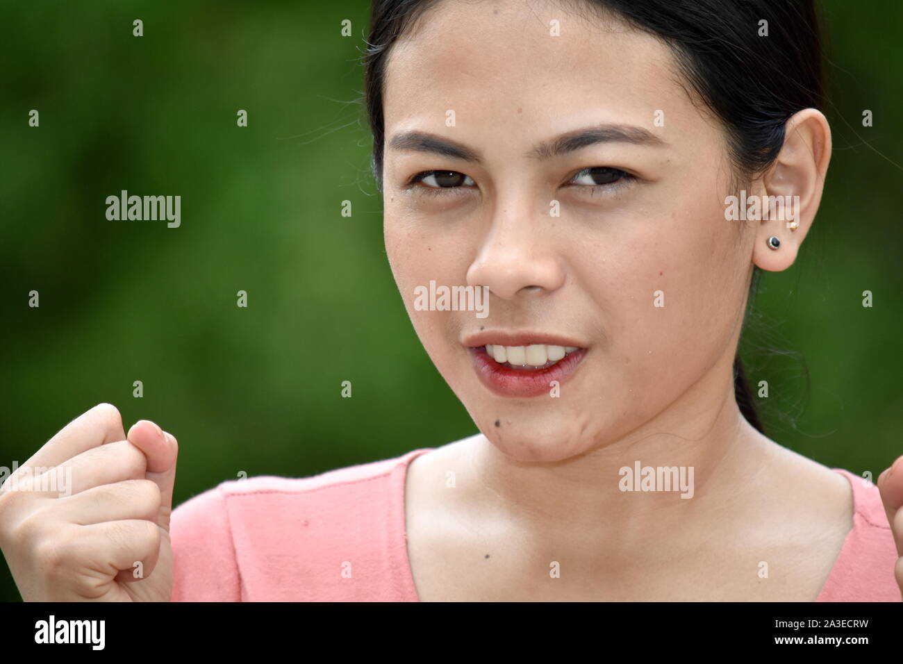Eine verärgerte Asiatische Person Stockfoto